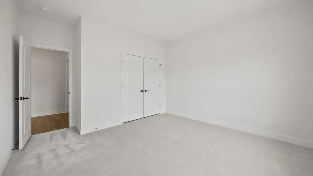 The Brentwood Plan by DRB Homes in River District, Charlotte NC.- Bedroom