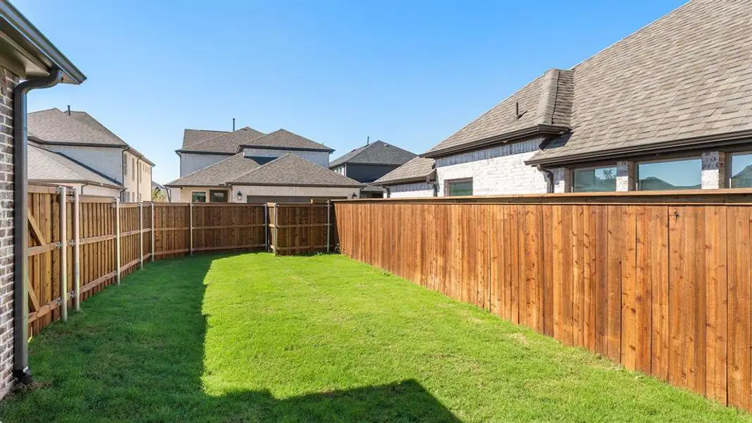 Exterior details and patio area of a home in The Parks At Wilson Creek 40', Celina (Image 2). Exterior details and patio area of a home in The Parks At Wilson Creek 40', Celina (Image 2).