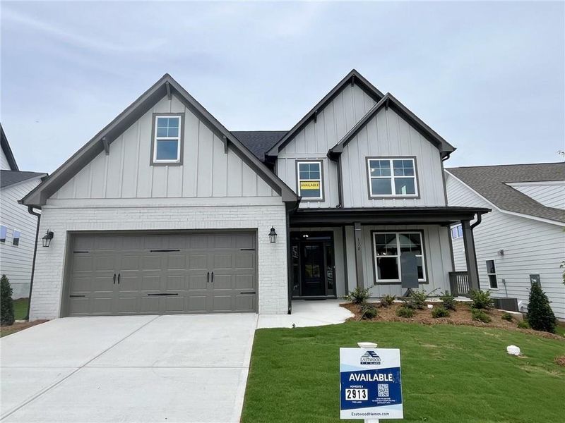 Front exterior of a new home in Twin Lakes, Hoschton, GA, highlighting curb appeal (Image 2).