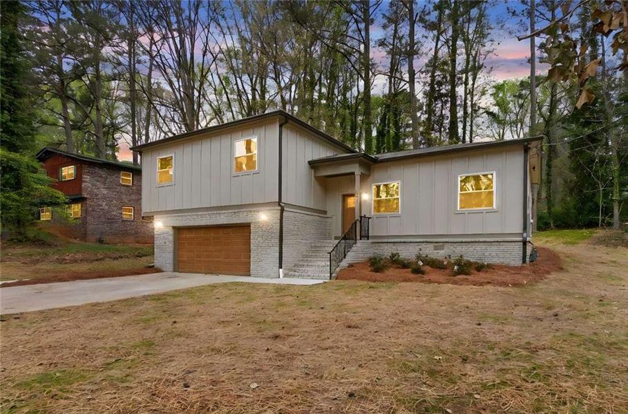 Front exterior of a new home in , Atlanta, GA, highlighting curb appeal (Image 28).