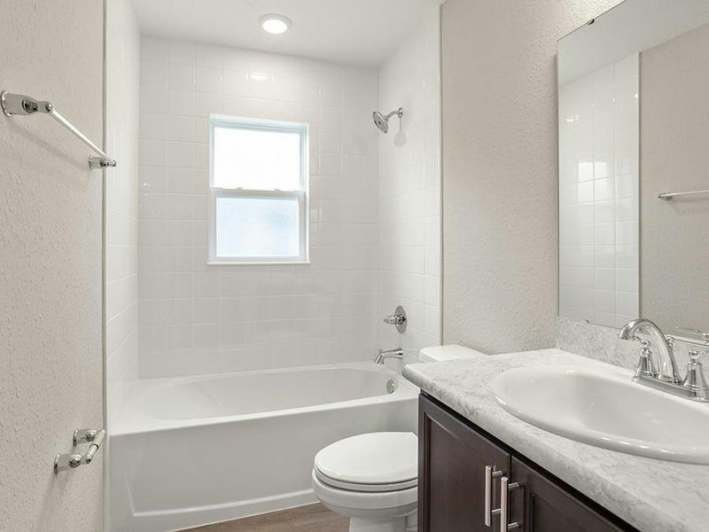 Secondary bedrooms share a convenient hall bath. Secondary bedrooms share a convenient hall bath.