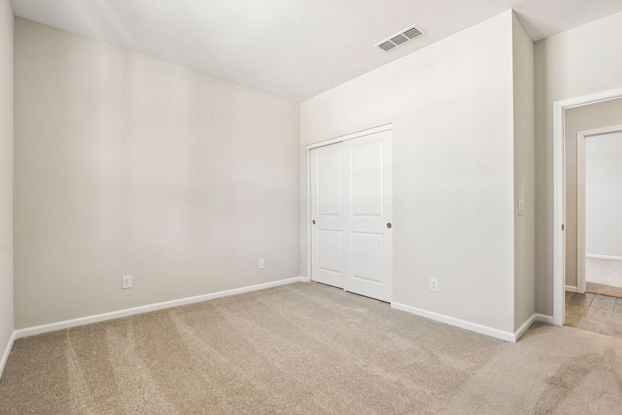 A room with white doors.