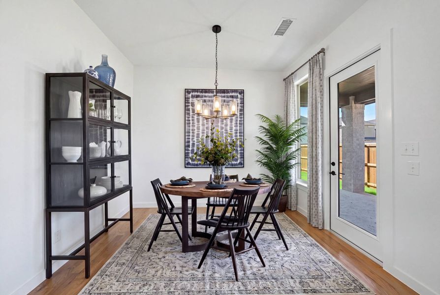Furnished interior view inside a new home in Light Farms Brenham - 40' Lots, Celina (Image 15).