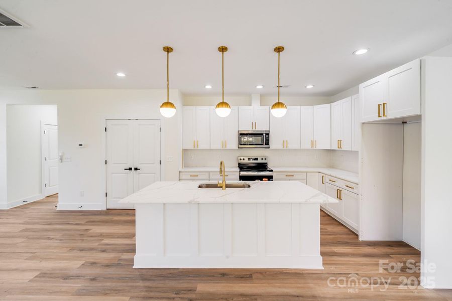 Furnished interior view inside a new home in , Concord (Image 6).