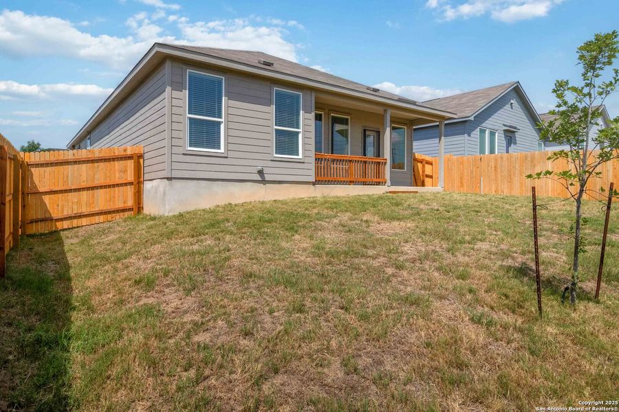 Front exterior of a new home in Sage Meadows: Coastline Collection, St. Hedwig, TX, highlighting curb appeal (Image 2). Front exterior of a new home in Sage Meadows: Coastline Collection, St. Hedwig, TX, highlighting curb appeal (Image 2).