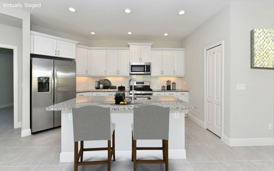 Representative furnished interior of a home built from the Patriot by Neal Communities in Vicenza, Venice (Image 5).