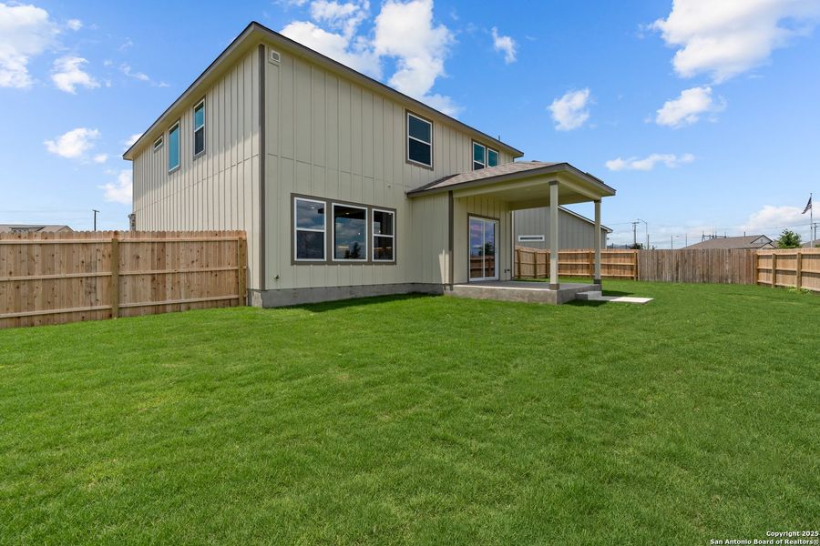 Exterior details and patio area of a home in Weltner Farms 50’s, New Braunfels (Image 25).