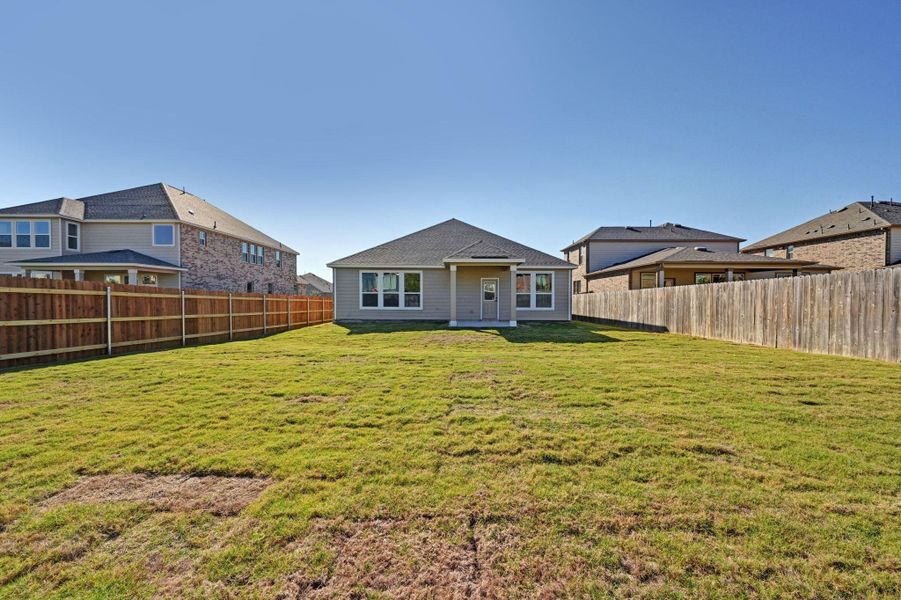 Exterior details and patio area of a home in Salerno - Classic Collection, Round Rock (Image 22).