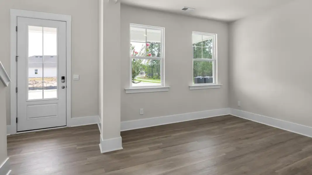Representative unfurnished interior of a home built from the Forrester by D.R. Horton in The Highlands at Cedar Hill Landing, Navassa (Image 15).