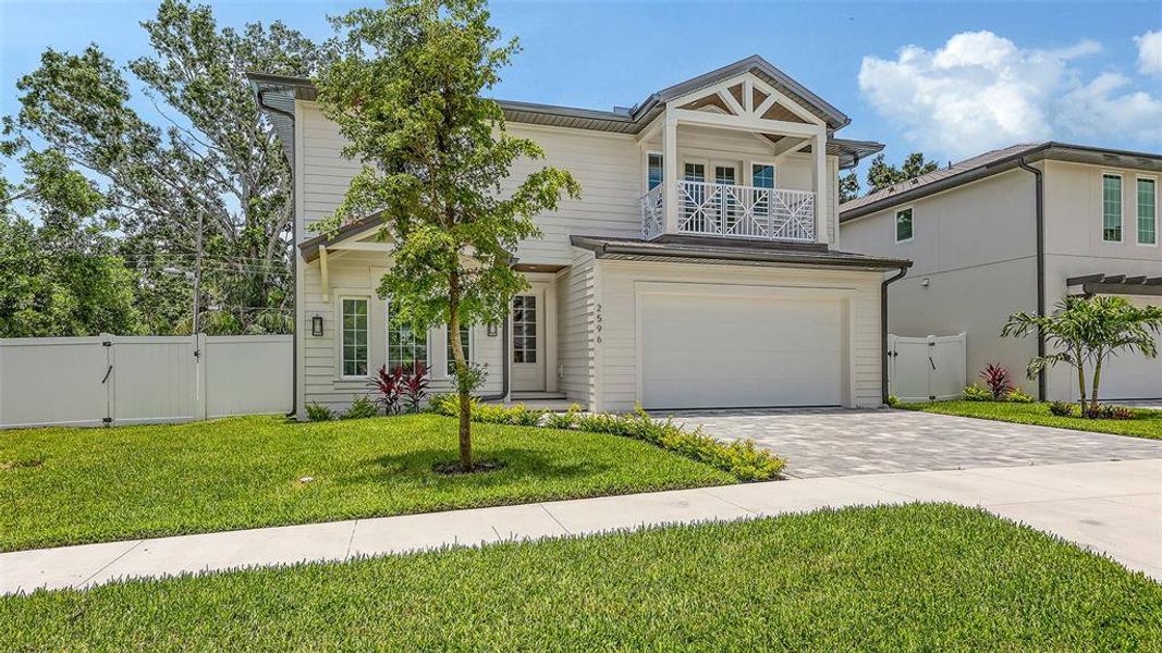 Front exterior of a new home in , Sarasota, FL, highlighting curb appeal (Image 1).