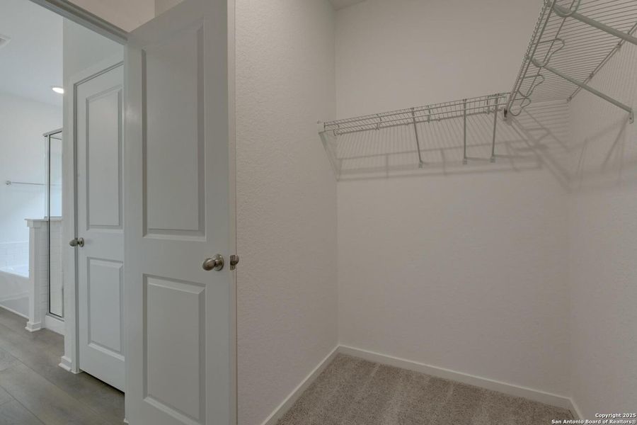 Spacious, unfurnished interior of a new home in Meadows at Hennersby Hollow 40's, San Antonio (Image 19).