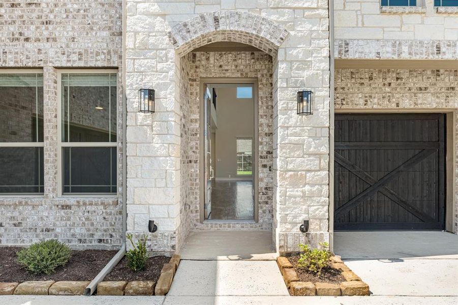 Front exterior of a new home in Mockingbird Heights Classic 60, Midlothian, TX, highlighting curb appeal (Image 27).