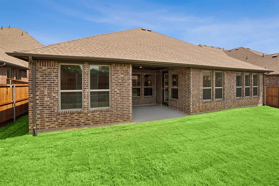 Exterior details and patio area of a home in Sterling Greene, Arlington (Image 2). Exterior details and patio area of a home in Sterling Greene, Arlington (Image 2).