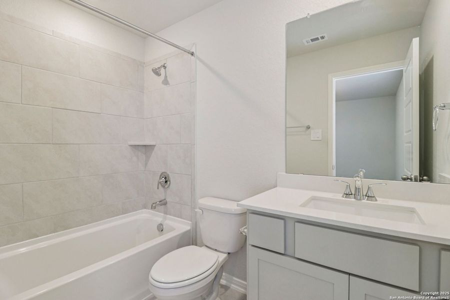 Furnished interior view inside a new home in Estancia Ranch - Premier Series, San Antonio (Image 7). Furnished interior view inside a new home in Estancia Ranch - Premier Series, San Antonio (Image 7).