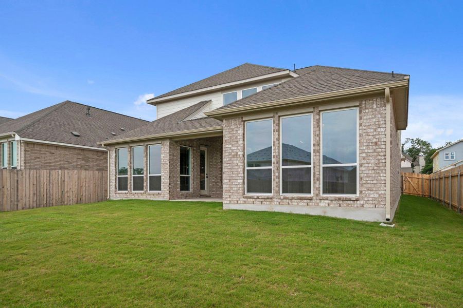 Rear of Home and Private Backyard