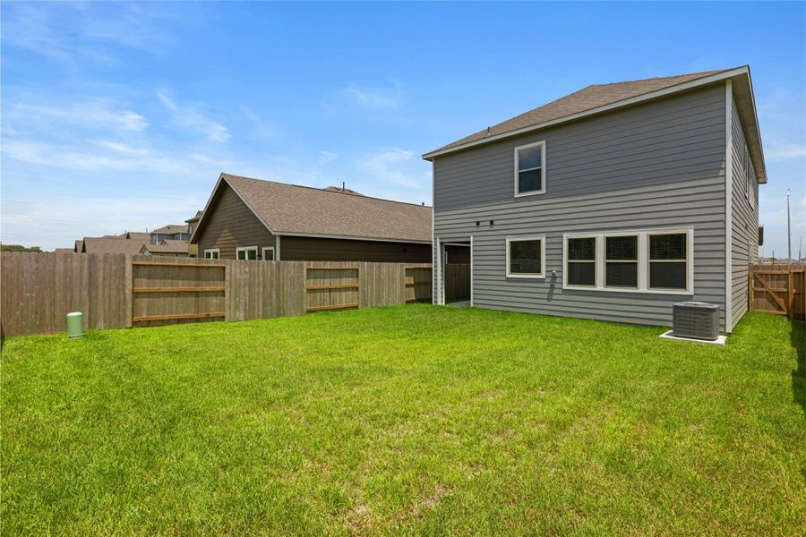 Exterior details and patio area of a home in Crosby Farms, Crosby (Image 2).