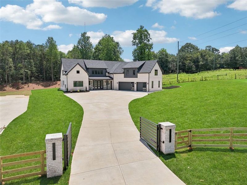 Front exterior of a new home in , Braselton, GA, highlighting curb appeal (Image 38). Front exterior of a new home in , Braselton, GA, highlighting curb appeal (Image 38).