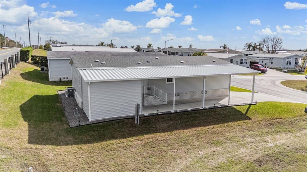Exterior details and patio area of a home in , Zephyrhills (Image 26).