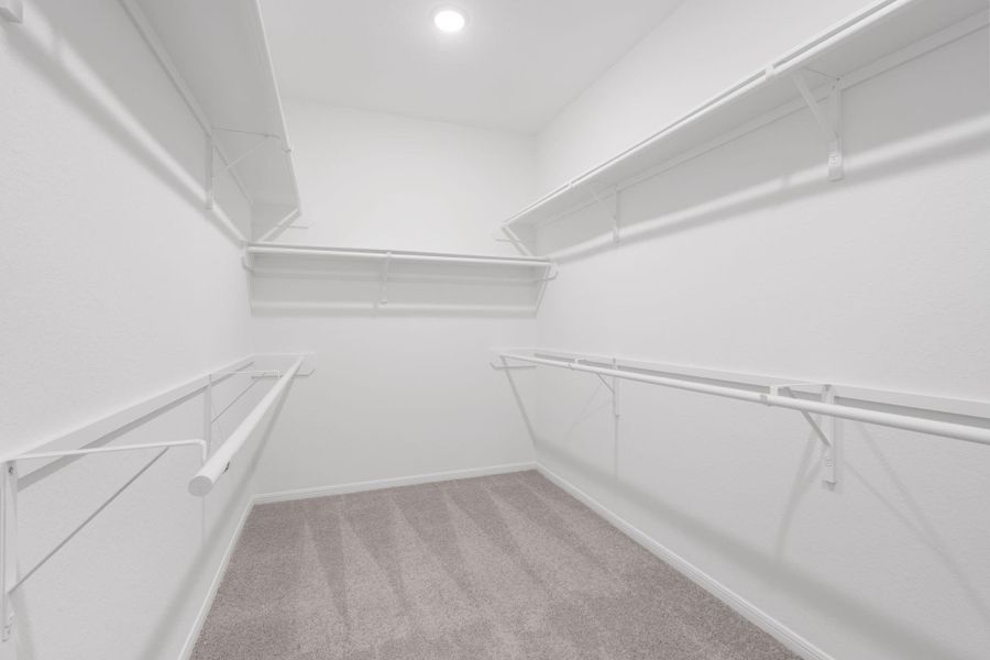 A view of your large primary walk-in Closet