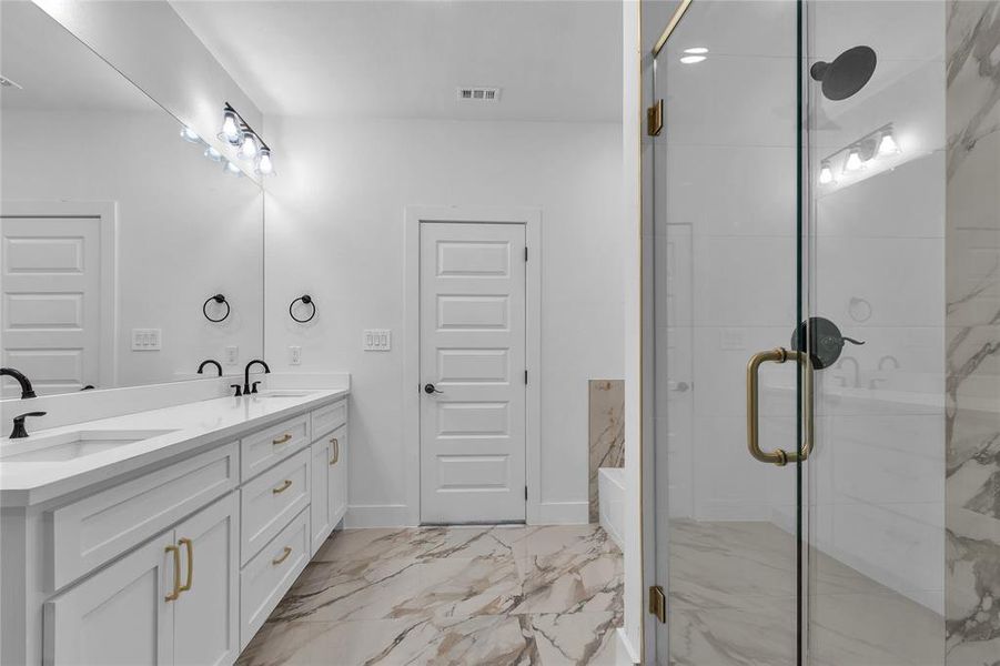 Bathroom with walk in shower and vanity and walk-in closet Bathroom with walk in shower and vanity and walk-in closet