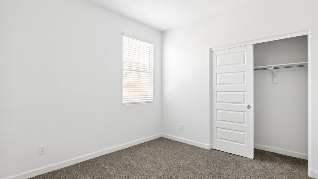 Representative unfurnished interior of a home built from the Raven by D.R. Horton in Magma Ranch Vistas, Florence (Image 22).