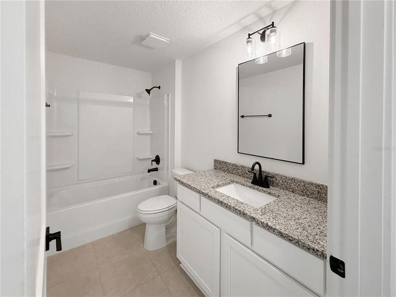 Furnished interior view inside a new home in Harmony Central, Harmony (Image 6).