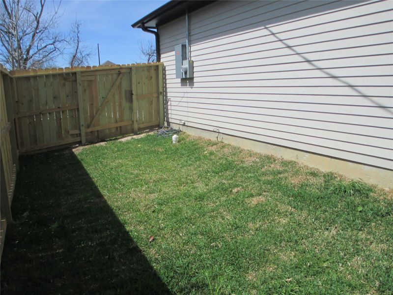 Exterior details and patio area of a home in , Baytown (Image 32).