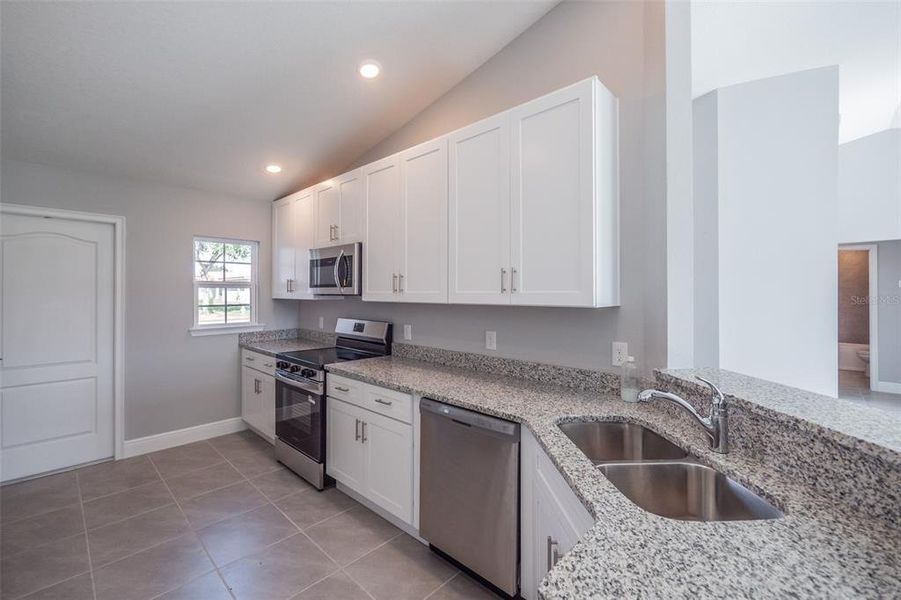 Furnished interior view inside a new home in , Kissimmee (Image 11).