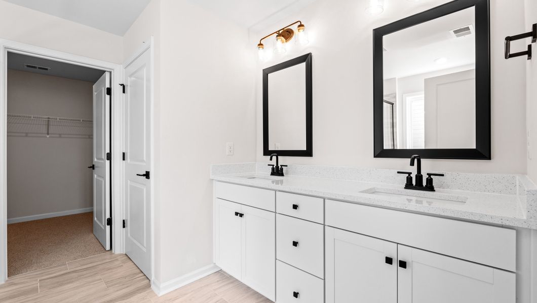 Representative furnished interior of a home built from the VERWOOD by D.R. Horton in Adams Glen, Greenville (Image 14).