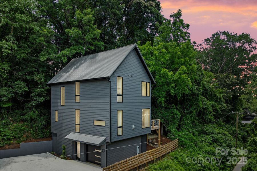 Front exterior of a new home in , Asheville, NC, highlighting curb appeal (Image 25).