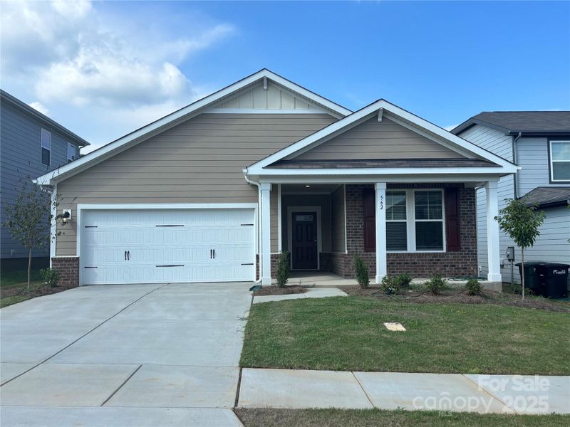 Front exterior of a new home in Blue Sky Meadows, Monroe, NC, highlighting curb appeal (Image 1).