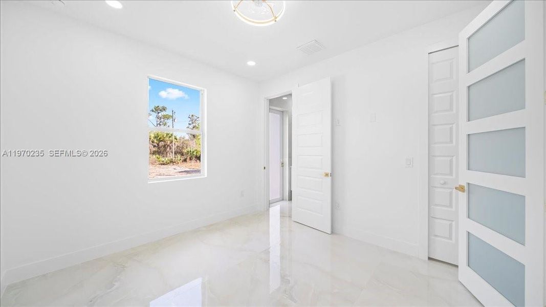 Spacious, unfurnished interior of a new home in , Lehigh Acres (Image 19).