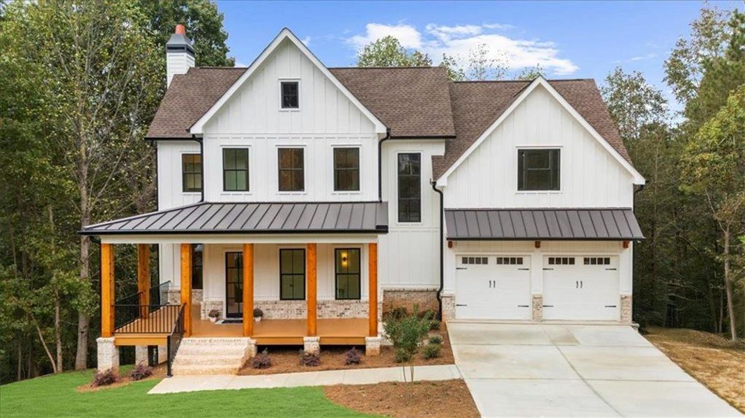 Front exterior of a new home in , Woodstock, GA, highlighting curb appeal (Image 1). Front exterior of a new home in , Woodstock, GA, highlighting curb appeal (Image 1).