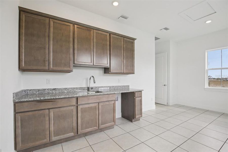 Furnished interior view inside a new home in Biscayne Landing at Seaire, Parrish (Image 12).