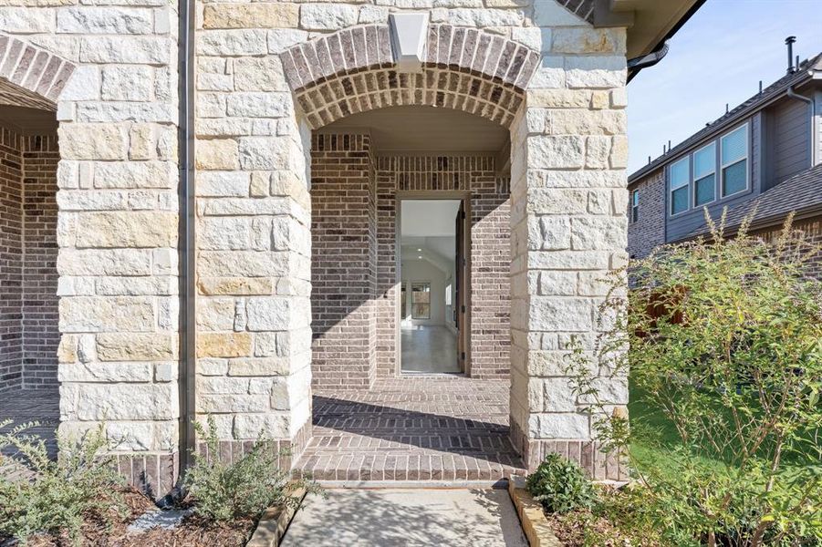 Exterior details and patio area of a home in West Crossing, Anna (Image 21). Exterior details and patio area of a home in West Crossing, Anna (Image 21).