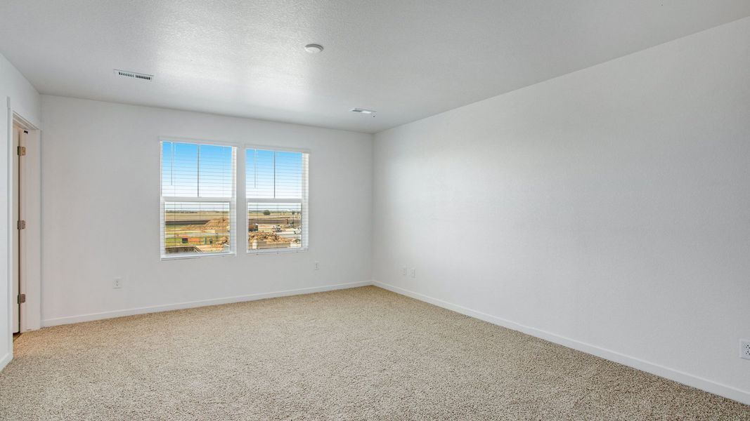 Spacious, unfurnished interior of a new home in Sky Ranch, Watkins (Image 14).