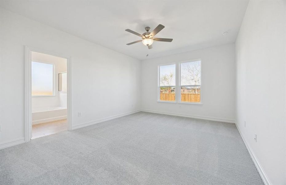 Spacious owner's suite with private bath