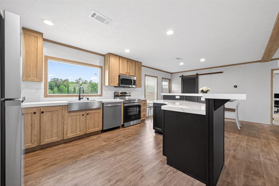 Detail shot emphasizing cabinetry, island space, and overall flow of the kitchen Detail shot emphasizing cabinetry, island space, and overall flow of the kitchen