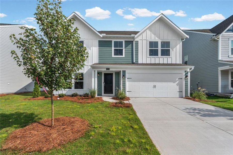 Front exterior of a new home in Twin Lakes, Hoschton, GA, highlighting curb appeal (Image 18).