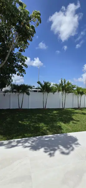 Exterior details and patio area of a home in , Miami (Image 19). Exterior details and patio area of a home in , Miami (Image 19).