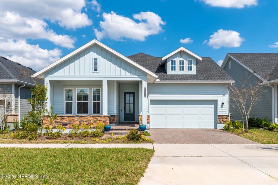Front exterior of a new home in , Jacksonville, FL, highlighting curb appeal (Image 26).