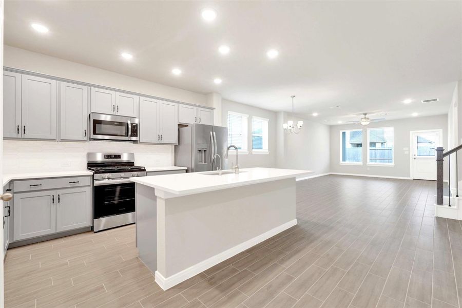 Open concept kitchen to dining area and living room