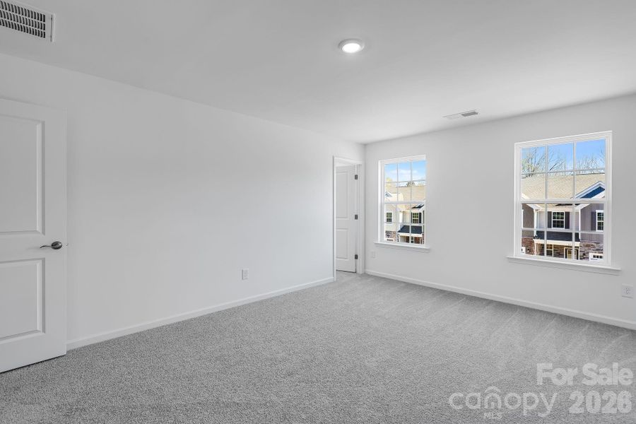 Spacious, unfurnished interior of a new home in Cannon Village, York (Image 10).