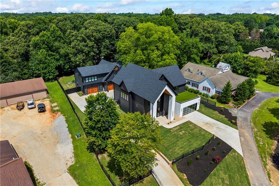 Front exterior of a new home in , Buford, GA, highlighting curb appeal (Image 31). Front exterior of a new home in , Buford, GA, highlighting curb appeal (Image 31).