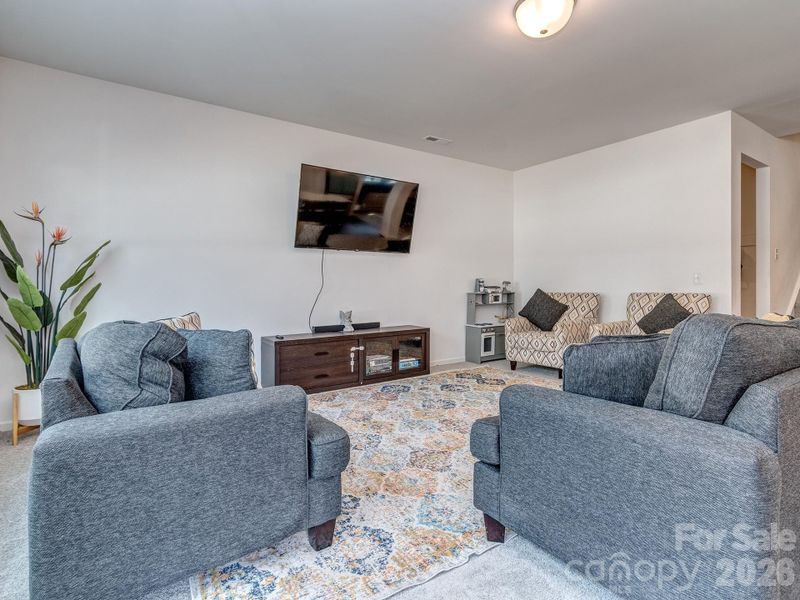 Furnished interior view inside a new home in , Statesville (Image 10).