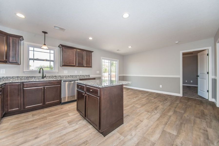 Representative furnished interior of a home built from the Archer by Enchanted Homes in Lonesome Dove, San Antonio (Image 11).