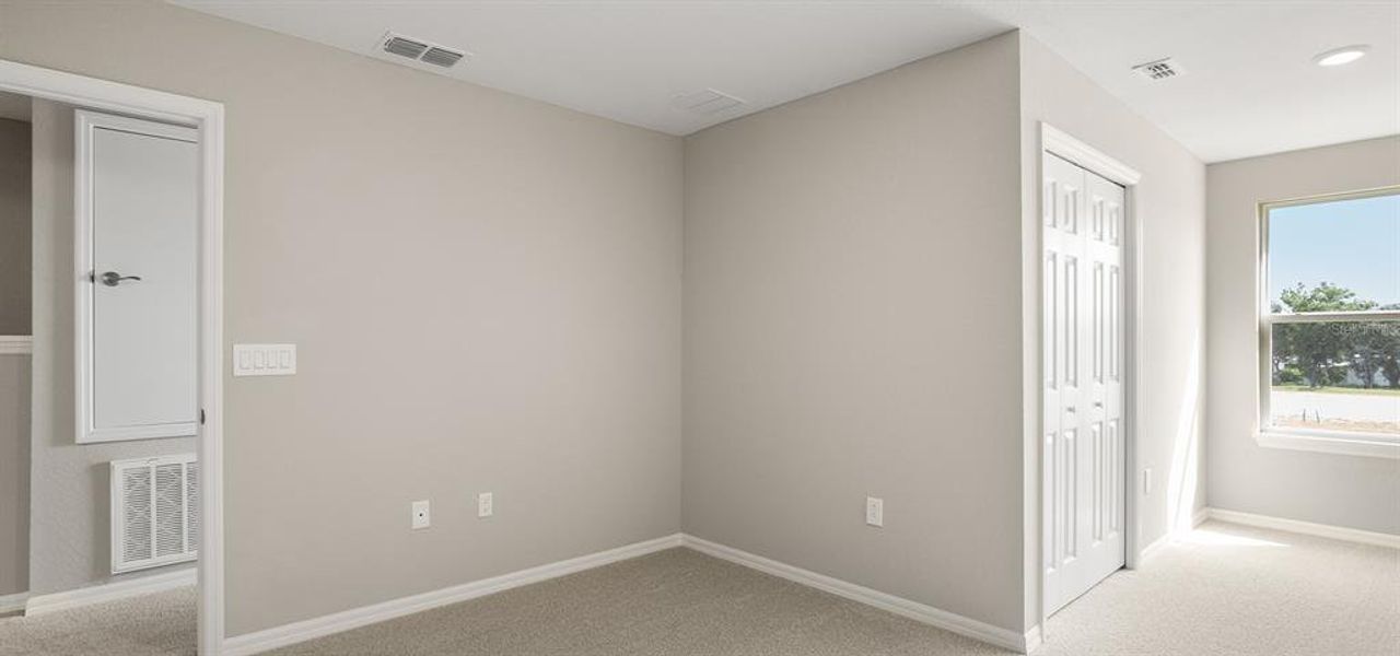 Spacious, unfurnished interior of a new home in Harbor at Lake Henry - Townhomes, Winter Haven (Image 16).