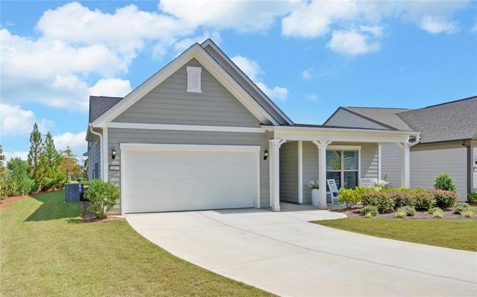 Front exterior of a new home in , Hoschton, GA, highlighting curb appeal (Image 22).