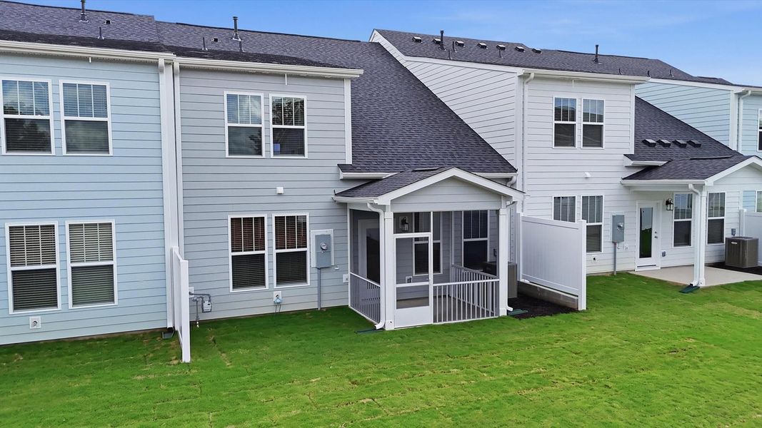 Elegant exterior with a rear screened-in porch—perfect for relaxing or entertaining outdoors near Lake Hartwell