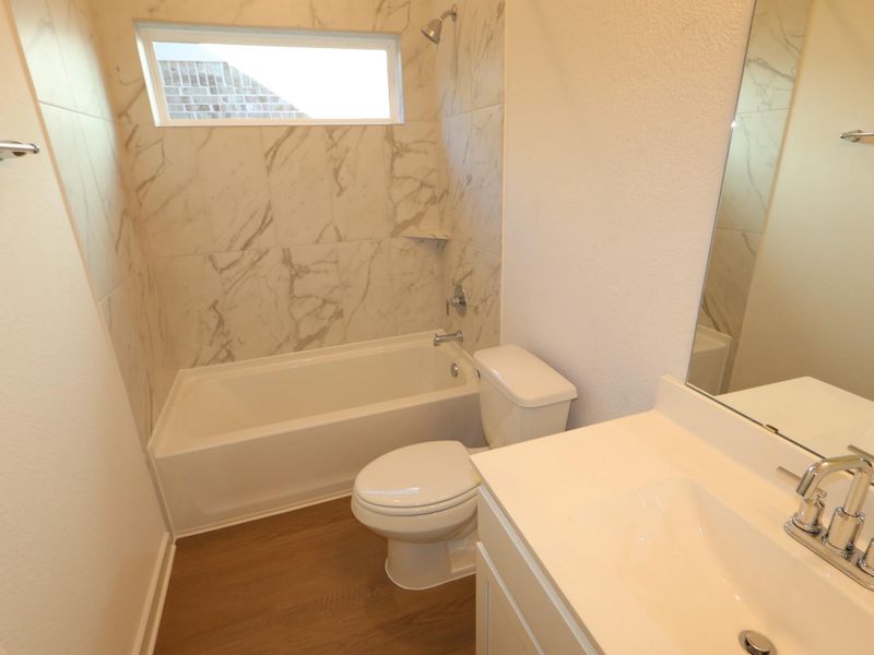 Furnished interior view inside a new home in Sorella, Tomball (Image 8).